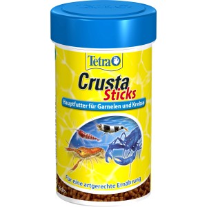 Tetra Crusta Sticks 100ml: Hauptfutter für Garnelen und Krebse im gelben Behälter mit blauem Deckel.
