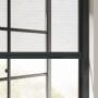 Cocoon Insektenschutzrollo mit Kassette in Anthrazit am Fenster.