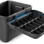 Schwarze Aufbewahrungsbox Scuba M mit blauem Silikonring im Deckel, geöffnet.