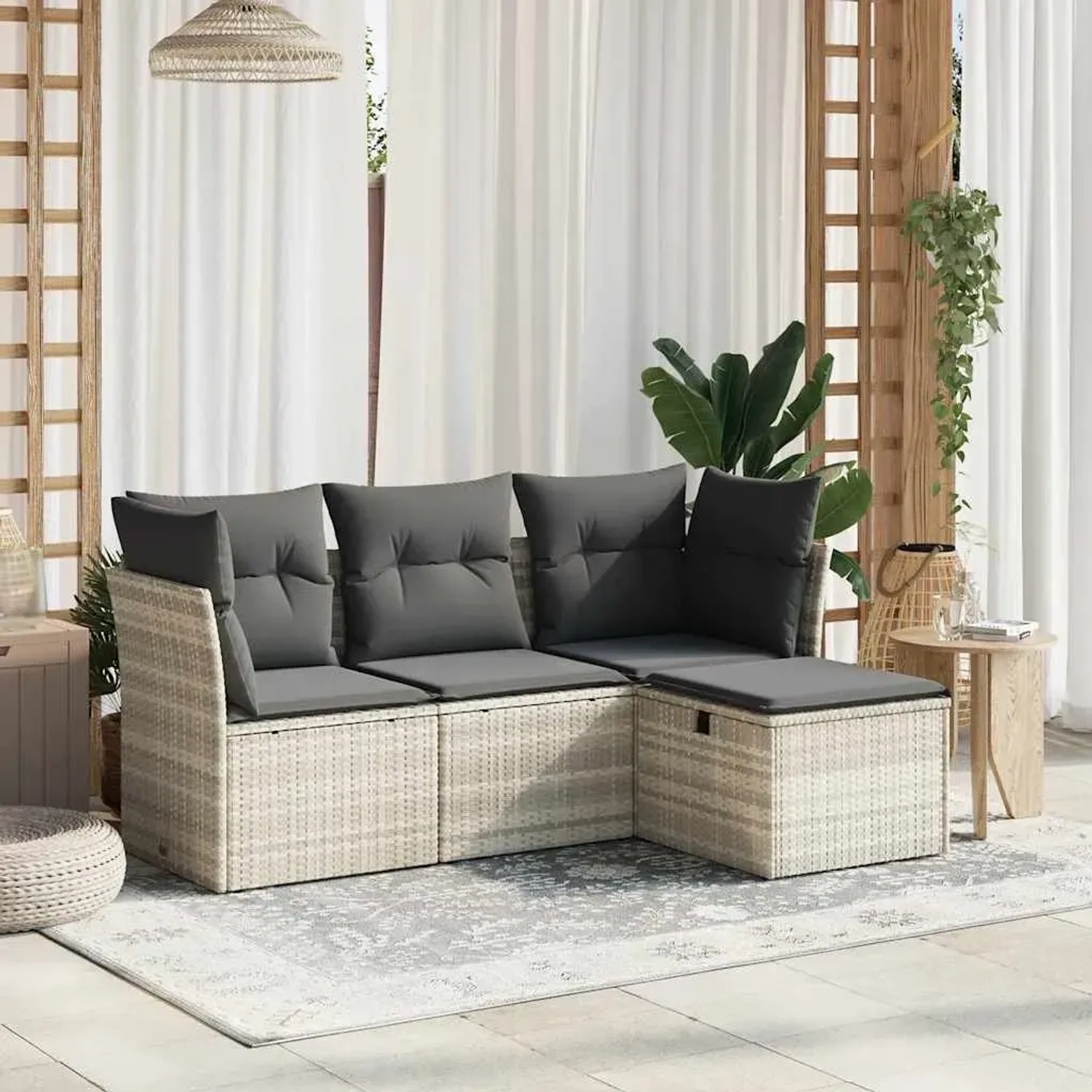 Hellgraue 4-tlg. Garten-Sofagarnitur aus Polyrattan mit grauen Kissen. Modulares Lounge Set für Terrasse und Garten.