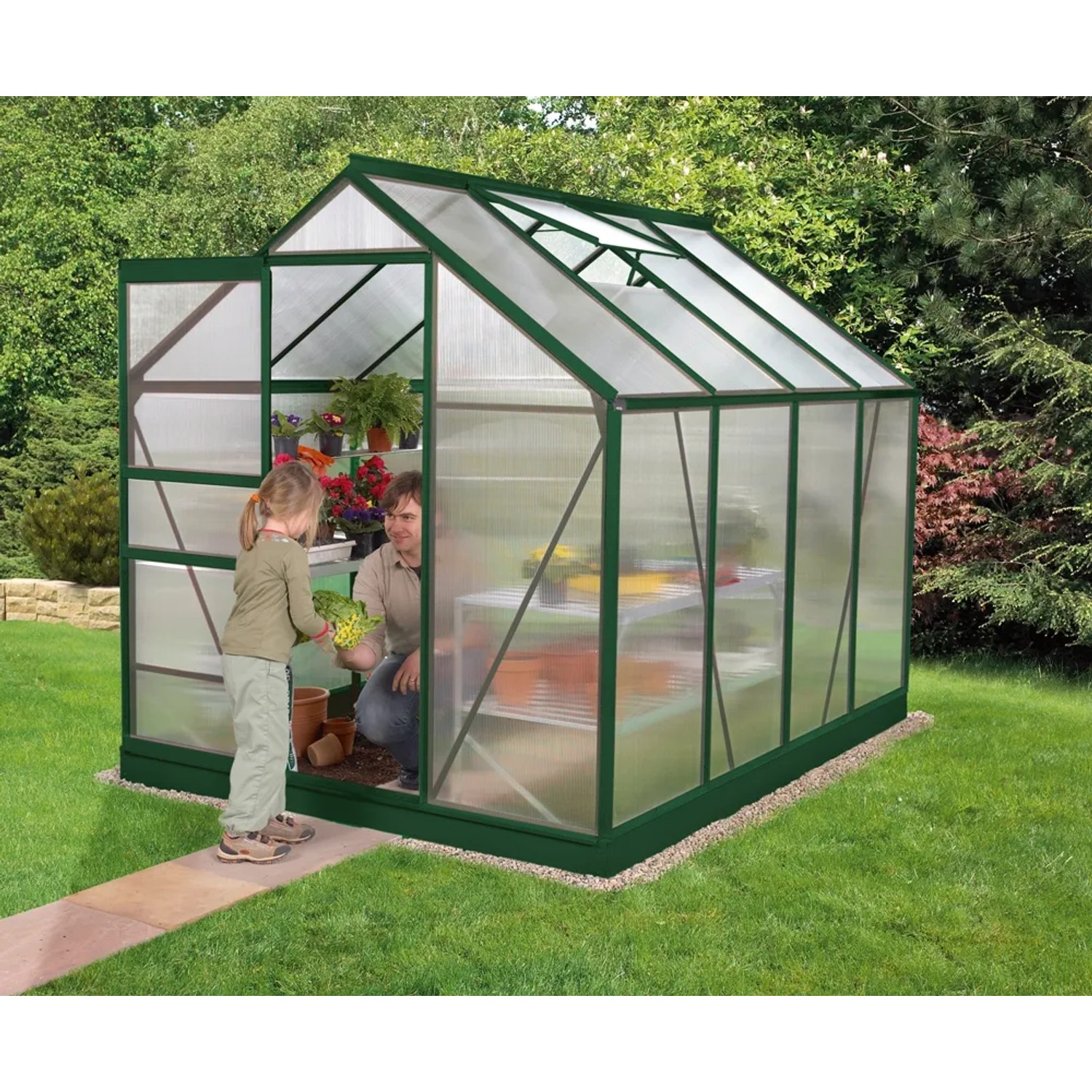 Vitavia Gewächshaus Venus 5000: Grünes Gartenhaus mit Kind und Mann im Garten.
