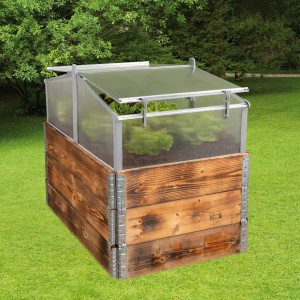 Transparentes Juwel Thermo-Frühbeet 115x75 cm auf Holzrahmen im Garten.