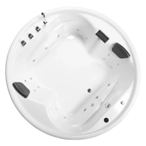 Runde, weiße Basera® Indoor Podest-Whirlpool Badewanne Gomera mit Armaturen und Kopfstützen.