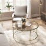 Eleganter Vasagle Couchtisch mit Glasplatte und goldenem Stahlrahmen im Wohnzimmer.