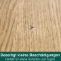 Beschädigter Eichenholzboden, ideal zur Reparatur mit dem Bona Home Repair Set.