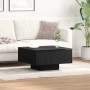 Moderner vidaXL Couchtisch in Schwarz Eichen-Optik, quadratisch, aus Holzwerkstoff. Im Wohnzimmer vor weißem Sofa.