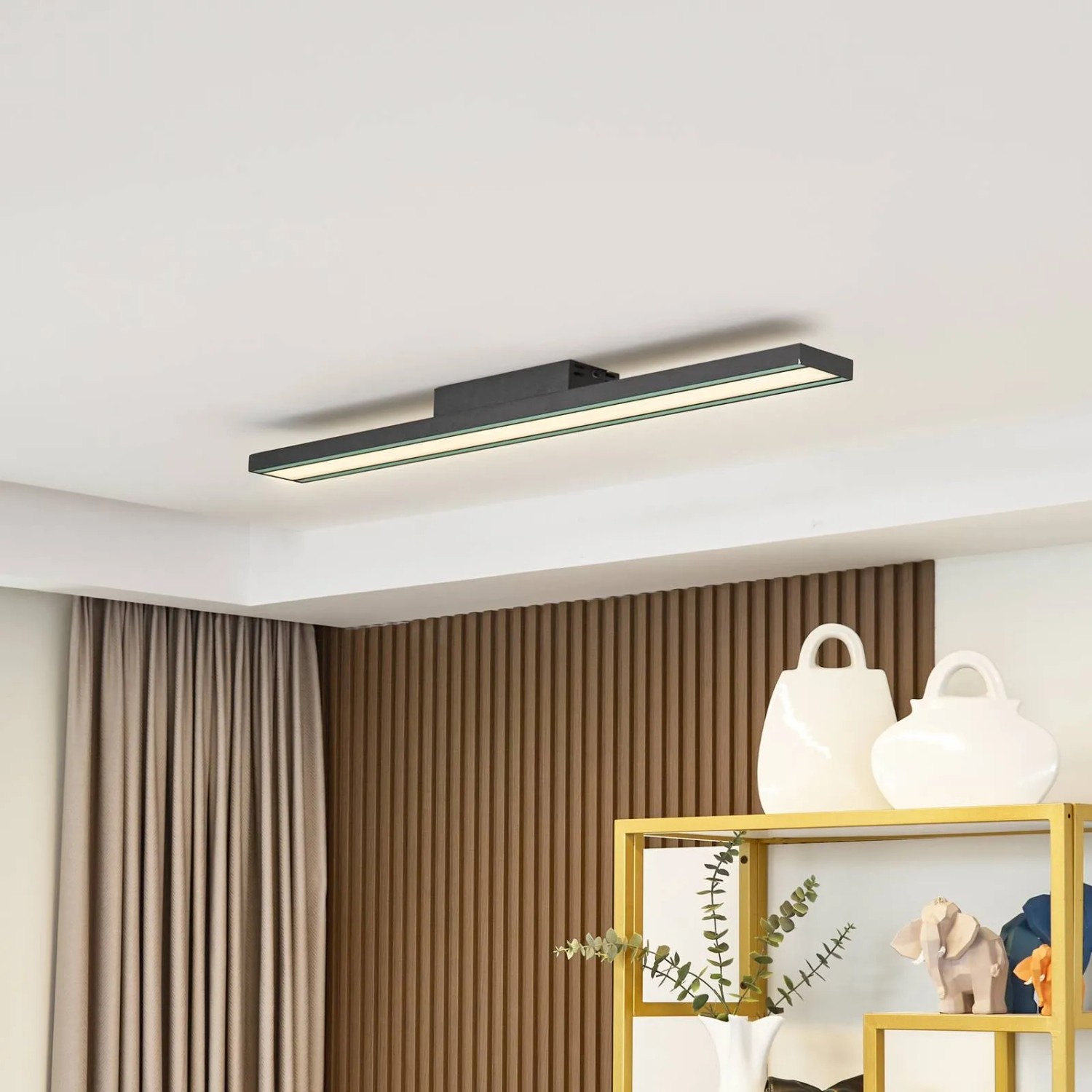 Moderne, dimmbare LED Smart Home Deckenlampe Leicy in Schwarz mit Leselampe.