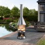 Buschbeck Edelstahlgrill Auckland, gebürsteter Edelstahl, mit Feuer und Grillrost im Garten.
