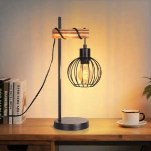 Vintage Tischlampe im Industriedesign aus schwarzem Metall und Holz, E27, leuchtend auf Holztisch.