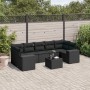Schwarze 8-teilige Garten-Sofagarnitur aus Poly Rattan mit Kissen und Tisch.