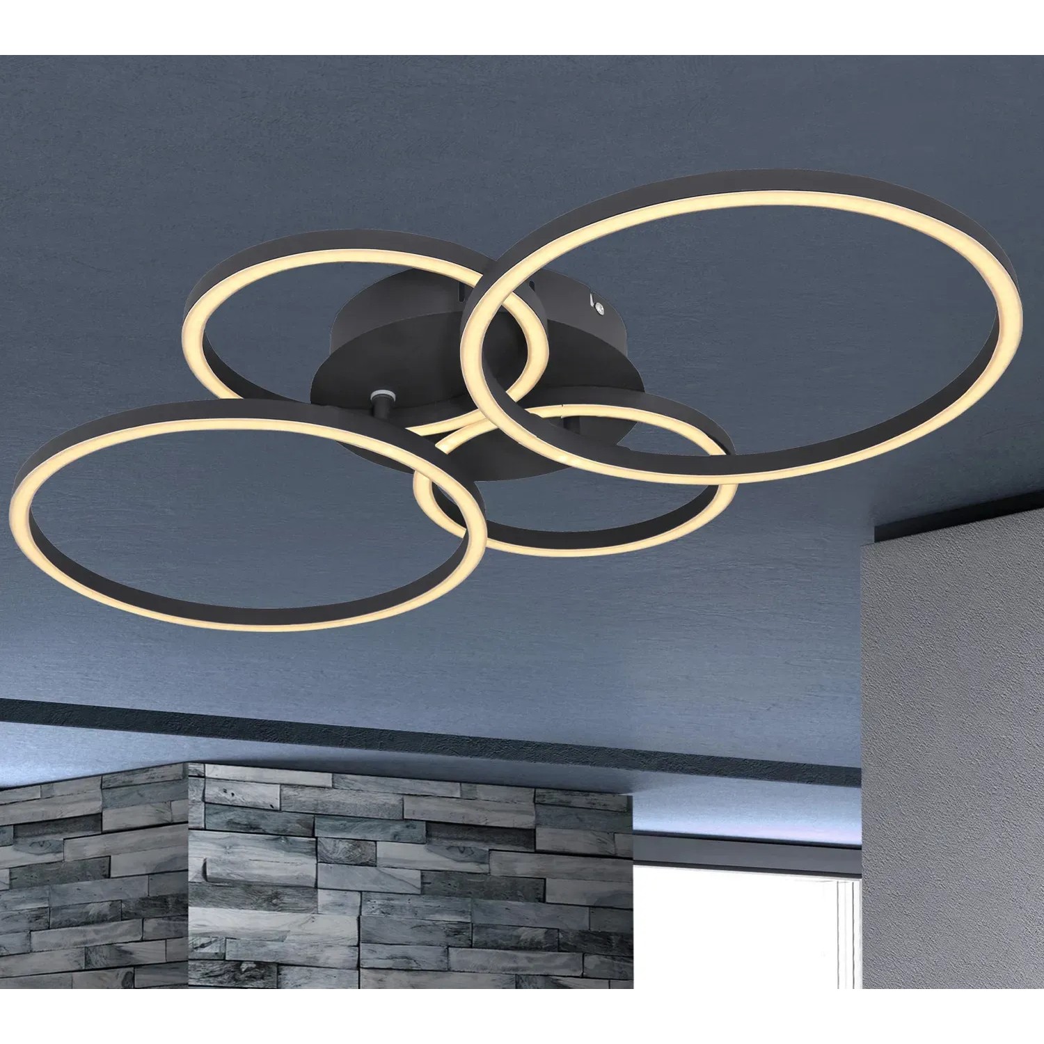 Moderne, schwarze LED-Deckenleuchte Kendy mit vier Ringen und energiesparendem Licht.