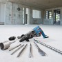 Bosch Professional GBH 2-28 F Bohrhammer mit Zubehör und Koffer im Rohbau.