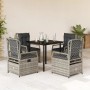 5-teilige Garten Essgruppe aus grauem Poly Rattan mit schwarzen Kissen und Tisch mit Glasplatte.