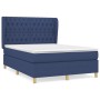 Blaues Boxspringbett (140x190 cm) mit Matratze und gestepptem Kopfteil.