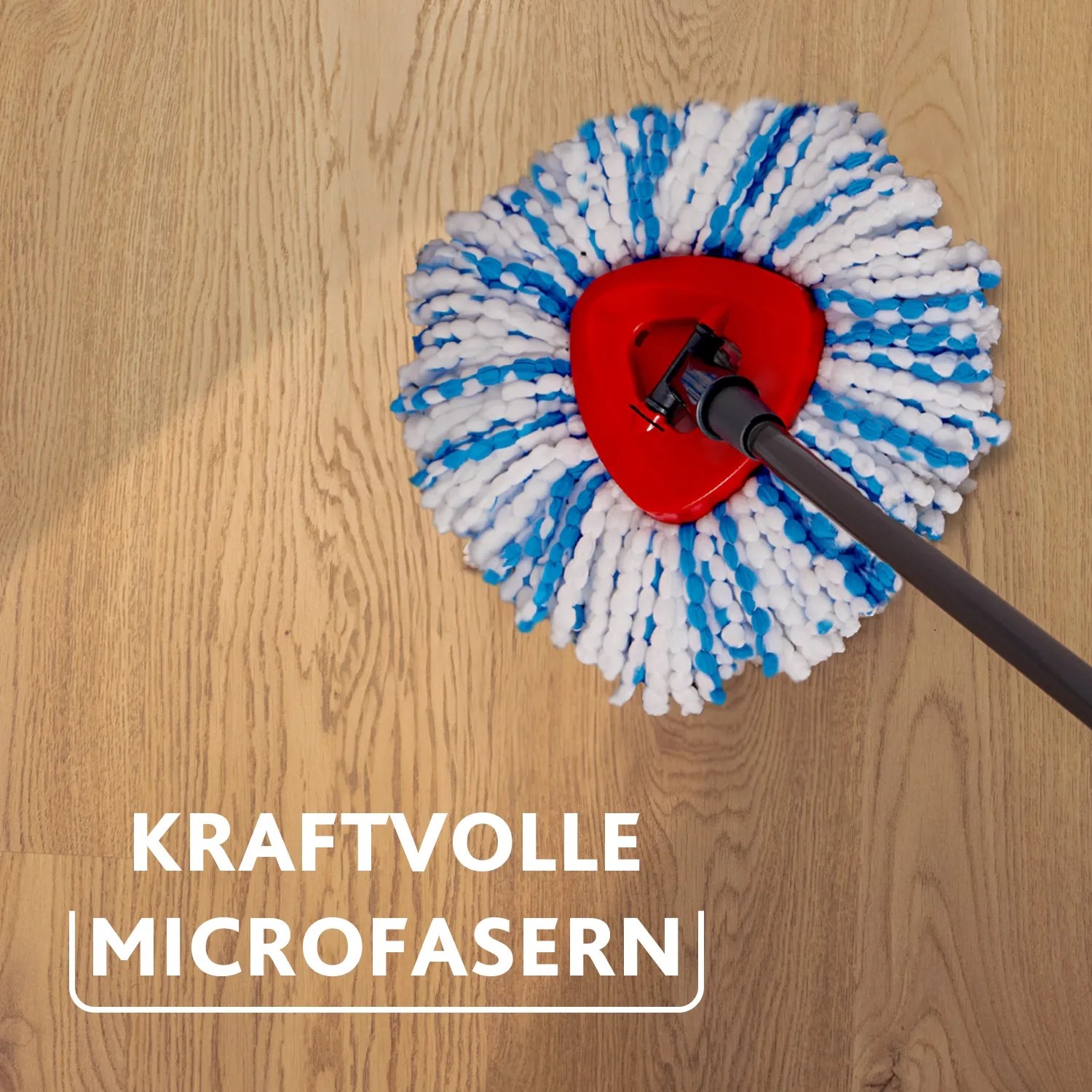 Vileda H2PrO Spin Mop mit Microfaser-Moppkopf auf Holzboden. Reinigungs-Set für streifenfreie Sauberkeit.