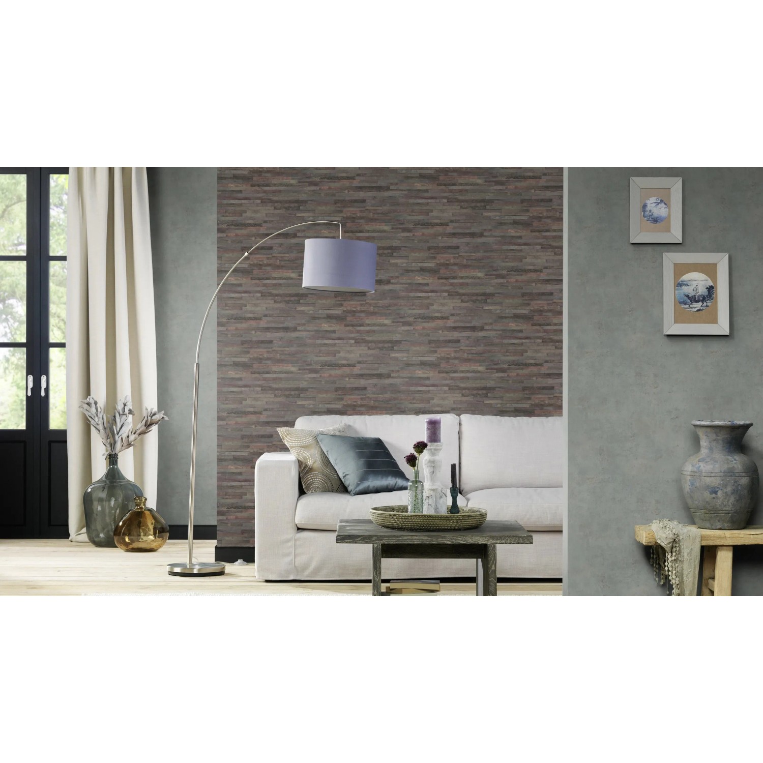 Rasch Vliestapete Factory IV 939545 in Grau mit Betonoptik im Wohnraum.