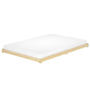 Extra niedriges Futonbett aus Kiefer Massivholz 140x200 mit weißer Matratze.