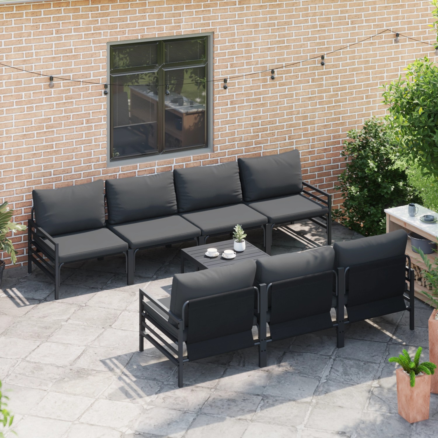 Anthrazitfarbenes 8-teiliges Garten-Sofa-Set mit Stahlrahmen und Gewebekissen.