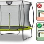 Grünes EXIT Silhouette Trampolin D244cm mit Sicherheitsnetz und Fußschutzsystem.