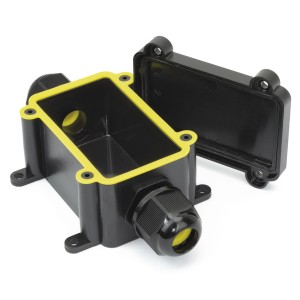Schwarze S-Impuls Abzweigdose IP68 für Außenbereich, mit gelber Dichtung und offenem Deckel.