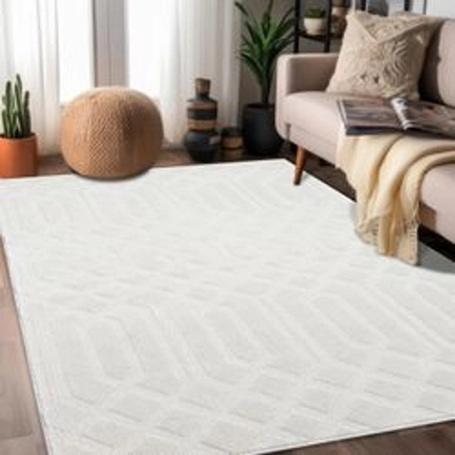 Cremefarbener Hochflor Teppich Esso 160x230 cm im Wohnzimmerambiente.