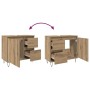 Waschbeckenunterschrank Artisan-Eiche, offen gezeigt mit Schubladen, Türen und Siphonausschnitt für Badmöbel. Holzwerkstoff, Eisenbeine.