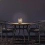 Näve LED-Solarleuchte Korbinian auf Tisch, Deko-Leuchte mit Hanfschnur, warmweißes Licht.