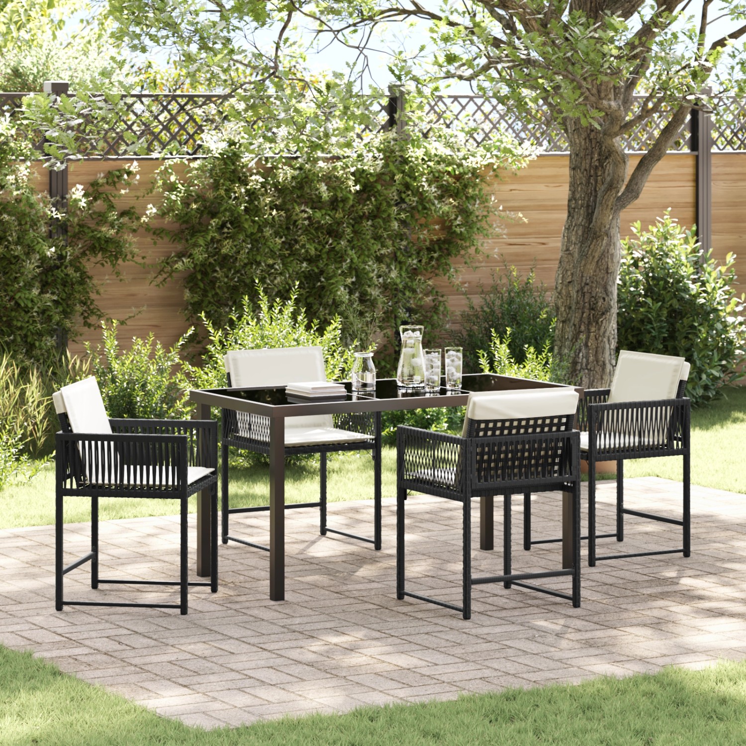 Schwarze 5-teilige Garten Essgruppe aus Poly Rattan von vidaXL. Gartenmöbel Set mit Tisch und Stühlen.