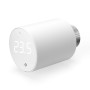 3er Pack Shelly Heizkörperthermostat: Weißer Ventilkopf mit digitaler Temperaturanzeige.