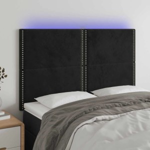 Schwarzes vidaXL LED Kopfteil aus Samt (144x128cm) mit Ziernägeln und blauer Beleuchtung am Bett.