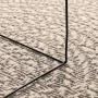 Cremefarbener Outdoor-Teppich in Jute-Optik, gewebte Polypropylen-Struktur. Detail mit schwarzem Rahmen. Indoor & Outdoor.