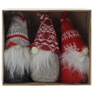 Drei Zwerge mit Mützen und Bart in einer Box. Rot, Grau und Weiß. Dekorative Figuren.