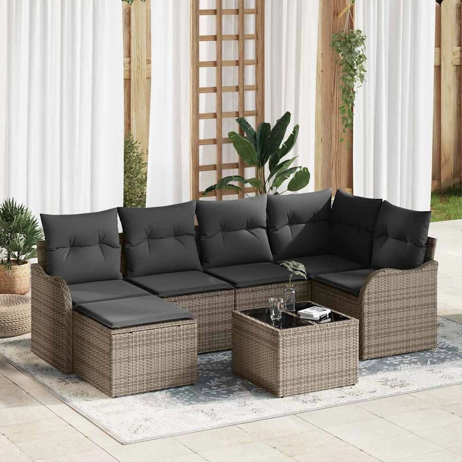 Graues 7-teiliges vidaXL Garten-Sofa-Set aus Poly Rattan mit Kissen und Tisch.