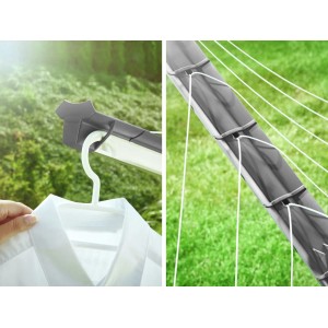 Detailaufnahme: Leifheit Wäschespinne Linomatic Plus mit Hemd am Bügelhalter im Garten.