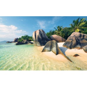 Vlies Fototapete Ozeanperle: Strand mit Felsen und türkisfarbenem Wasser.