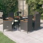 Schwarze 7-tlg. vidaXL Garten-Essgruppe mit Rattanstühlen, Holzarmllehnen und cremefarbenen Kissen.