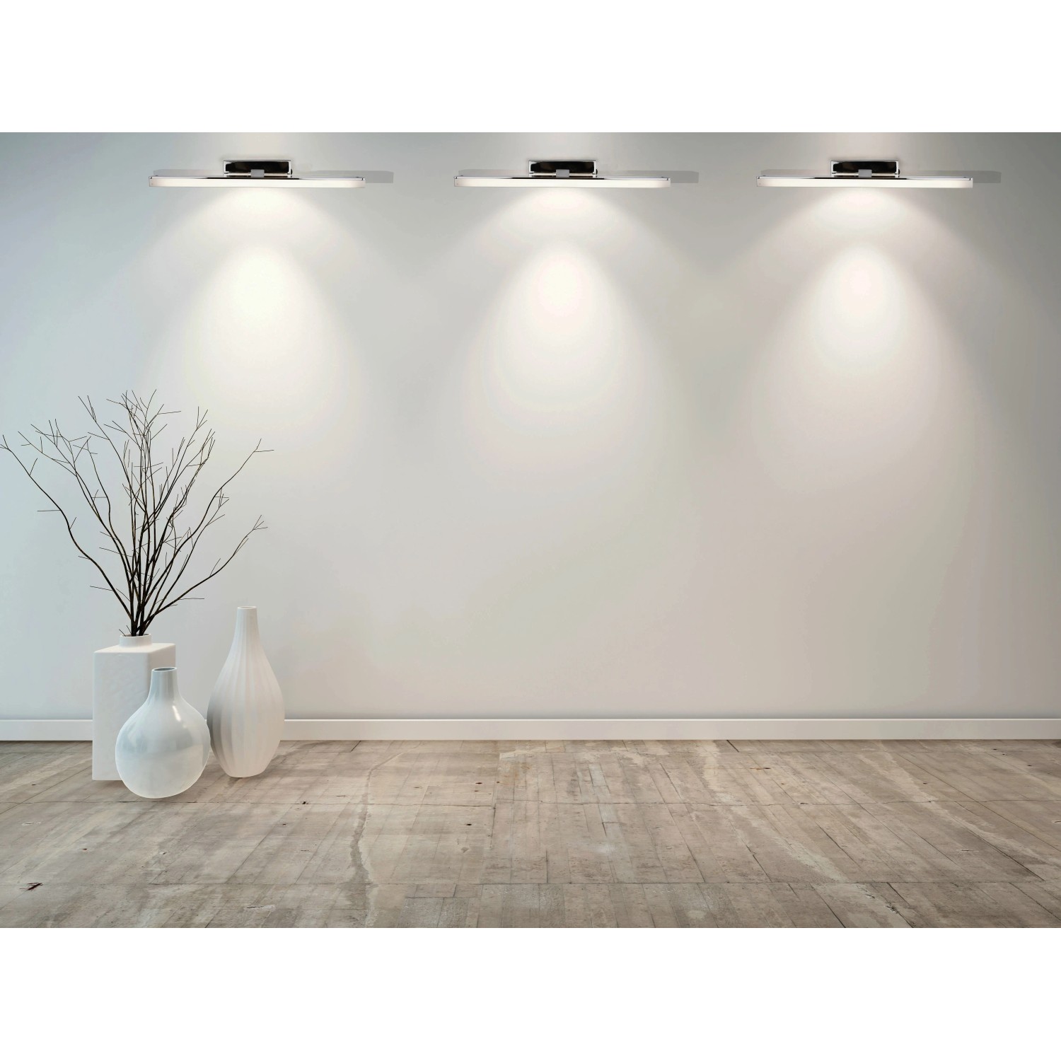 Drei Näve LED-Wandleuchten Vareta Chrom, 31,5 cm, an einer weißen Wand.