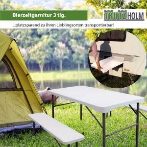 Weiße, klappbare TRUTZHOLM Bierzeltgarnitur (3-teilig) mit Tisch und Bänken im Garten.
