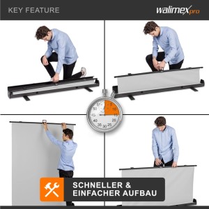 Mann baut grauen Walimex Pro Roll-Up Fotohintergrund (155x200cm) schnell auf. Einfacher Aufbau für Fotostudio.