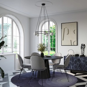 Schwarzer Sollux Lighting Kronleuchter Yoli 3 mit runder Form und weißen Kugeln über Esstisch.