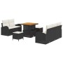 Schwarzes 8-tlg. Garten-Sofa-Set aus Poly Rattan mit Tisch und Hockern.