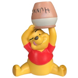 Gelbe Winnie Puuh Gartenfigur mit Honigtopf als Gartendeko.