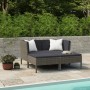 Graues 4-tlg. vidaXL Garten Lounge Set aus Rattan mit anthrazitfarbenen Auflagen.