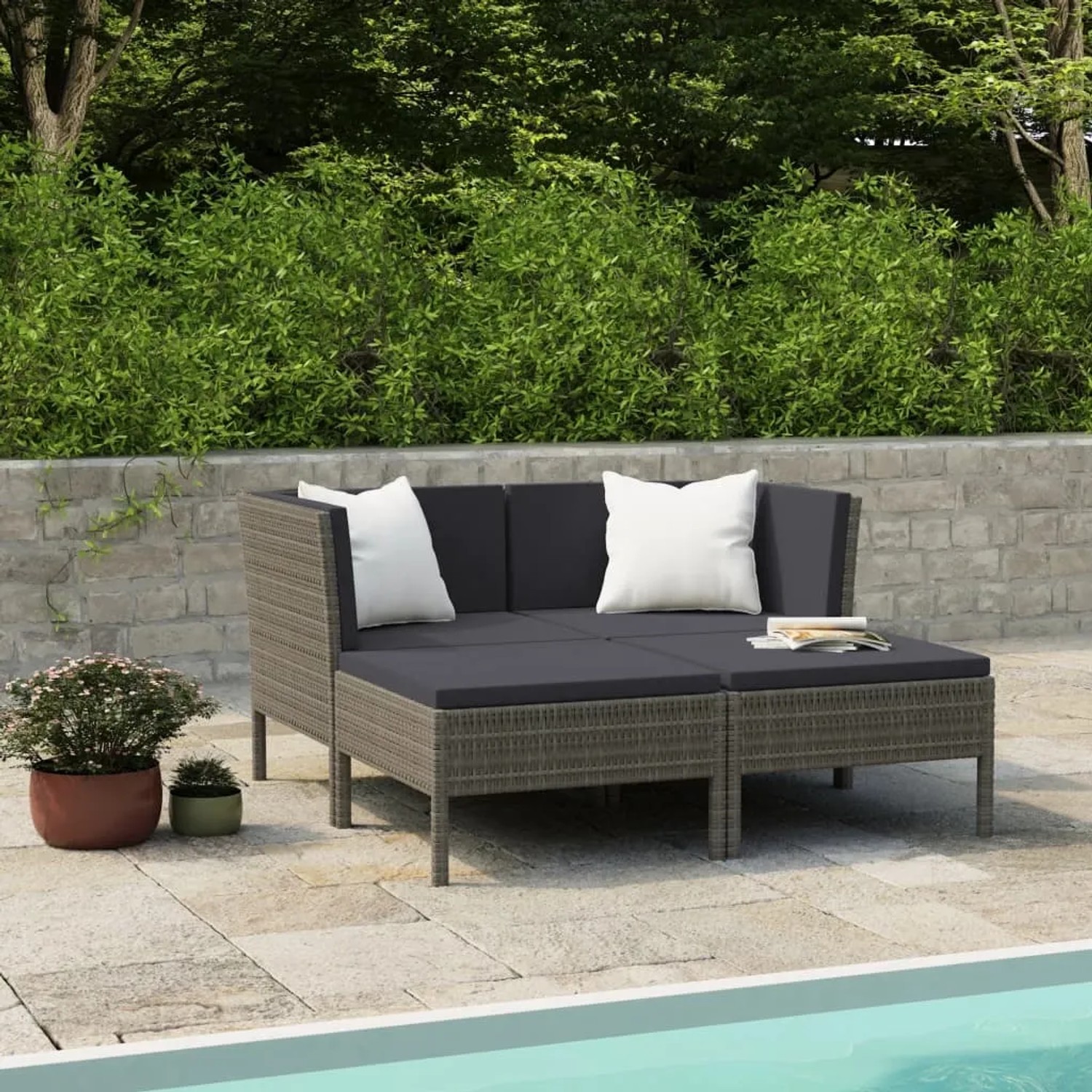 Graues 4-tlg. vidaXL Garten Lounge Set aus Rattan mit anthrazitfarbenen Auflagen.