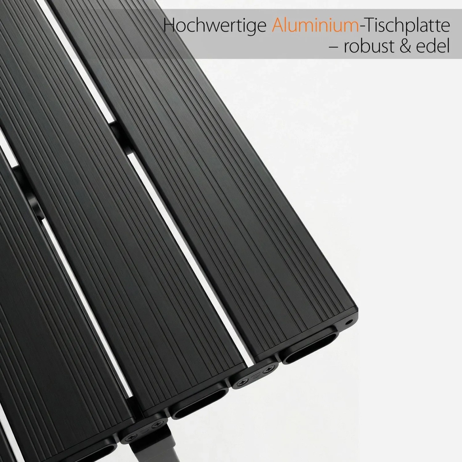 Nahaufnahme der schwarzen, rollbaren Aluminium-Tischplatte des Sekey Klapp-Campingtisches. Robustes Design für Camping & Outdoor.