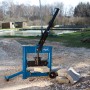 Scheppach Steintrenner HSC 130 zum Trennen von Steinen und Platten. Baumaschine mit Hebelarm und gefederten Tischauflagen.
