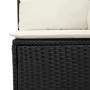 Detailaufnahme: Schwarzes Garten-Sofa-Set aus Rattan mit weißen Kissen.