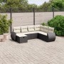 Schwarze 7-tlg. vidaXL Garten-Sofagarnitur aus Poly Rattan mit cremefarbenen Kissen im Garten.