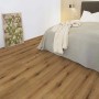 Kaindl Laminat Masterfloor Aqualine Eiche Evoke Sunset im Schlafzimmer verlegt.