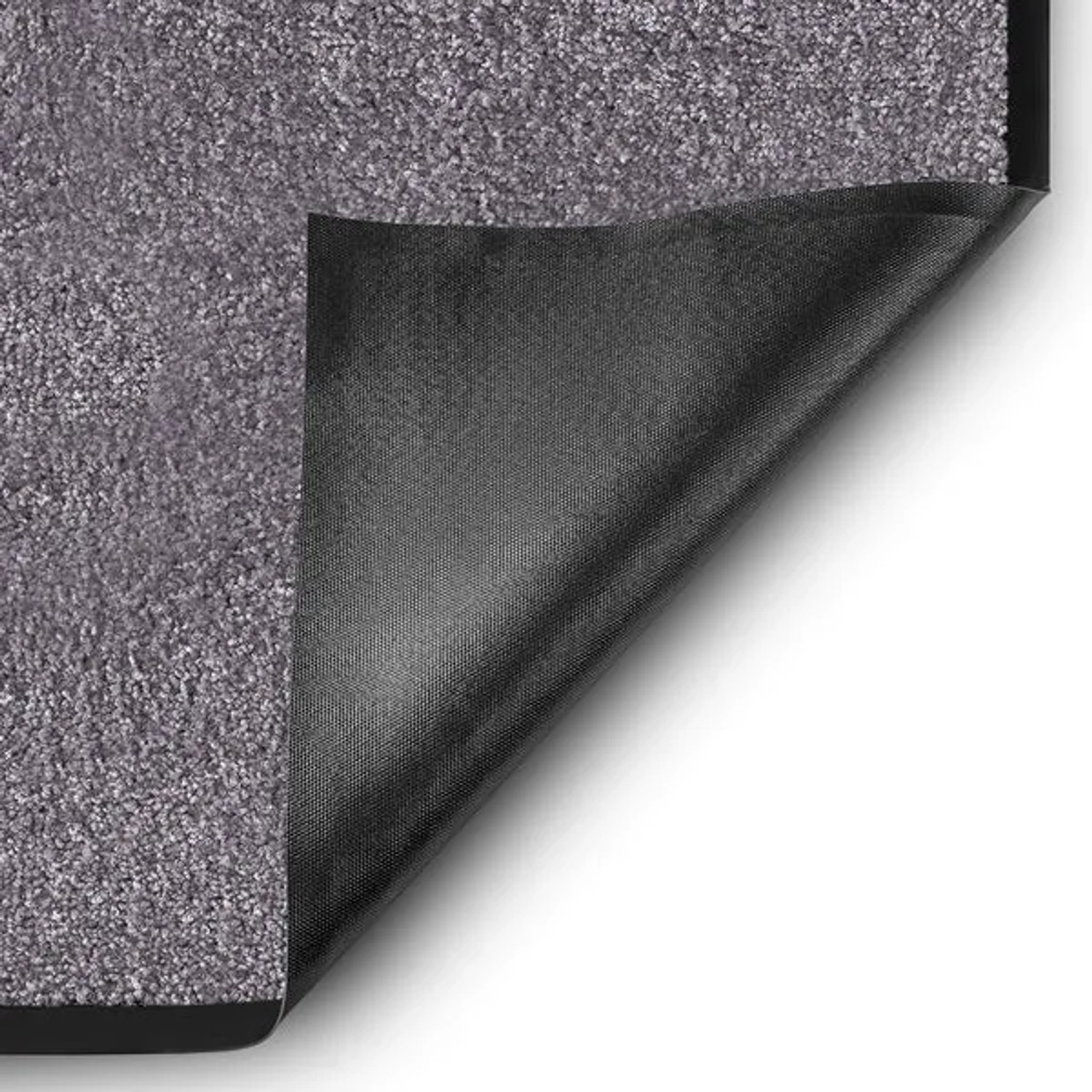 Beige-graue Karat Schmutzfangmatte Rhine 90x120cm mit aufgerollter Ecke, die die schwarze Vinyl-Rückseite zeigt.